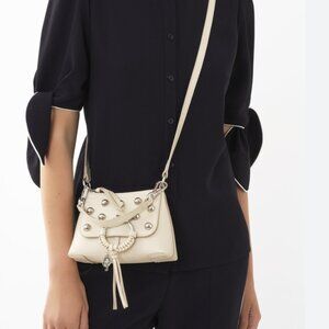 See by Chloé ring-detail silver studded cross body bag